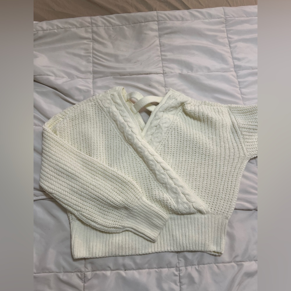 Cropped criss cross sweater